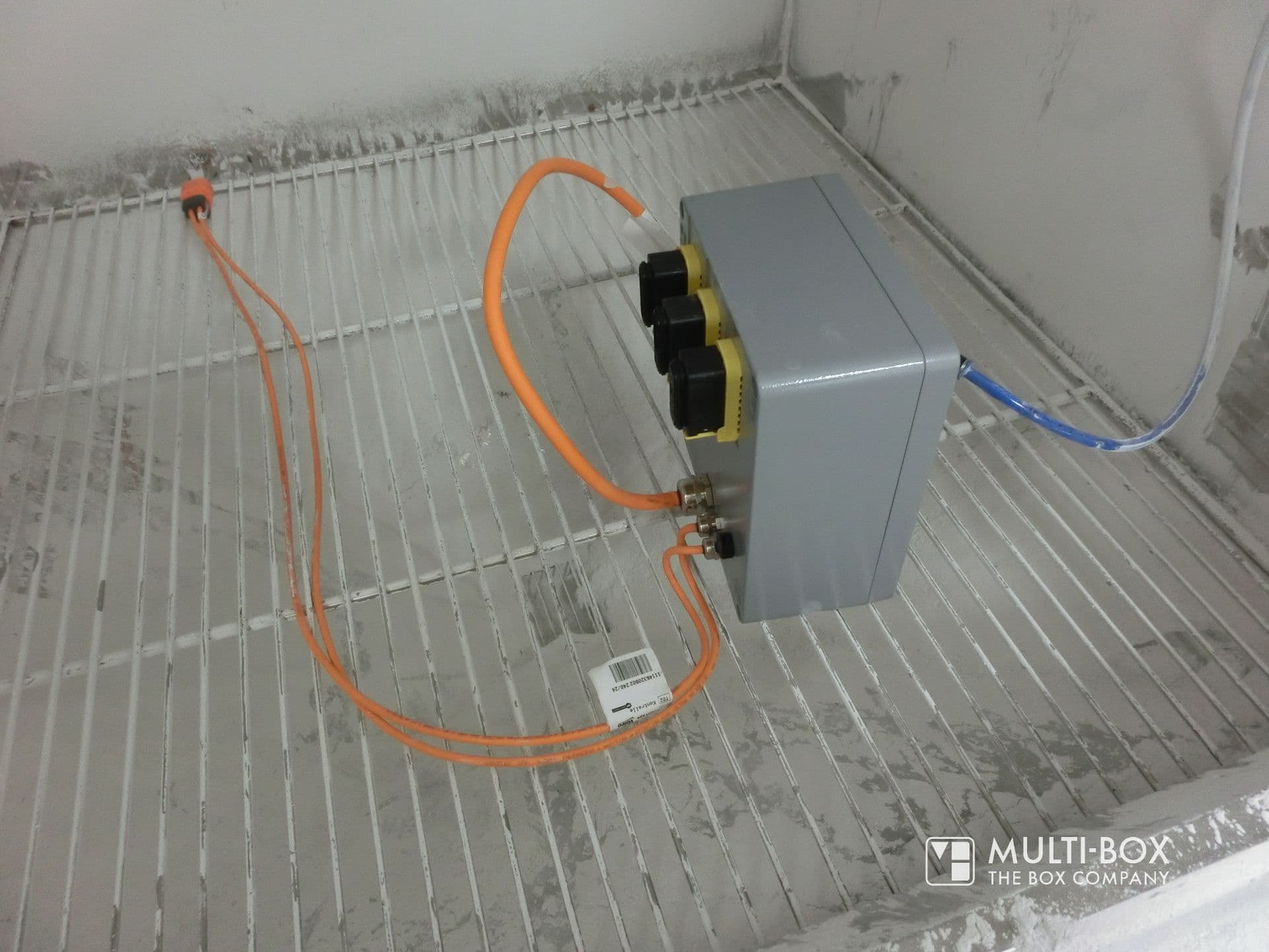 Industrial enclosure MBA in a test chamber during an IP protection type test in accordance with DIN EN 60529 to test dust tightness.